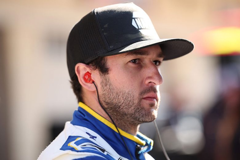 Chase Elliott looks on.