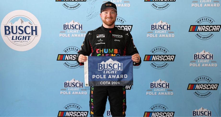 Tyler Reddick celebrates after winning the pole at COTA.