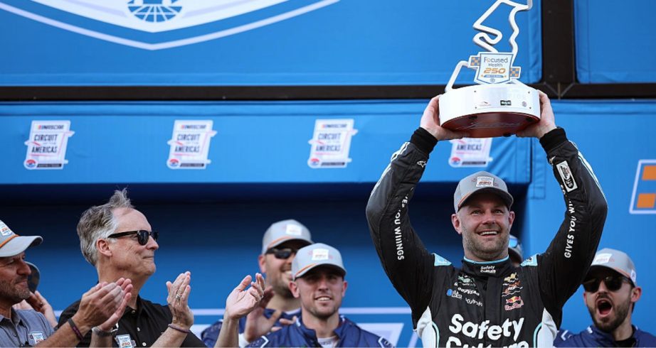 Shane van Gisbergen celebrates in Victory Lane at COTA.