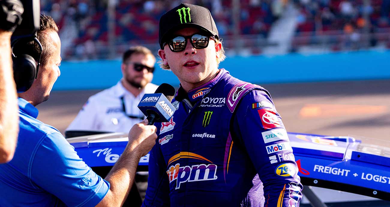 Ty Gibbs speaks to reporters after exiting his No. 54 Toyota at Phoenix Raceway