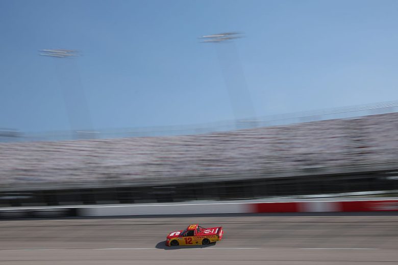 Brenden Queen drives at Darlington.