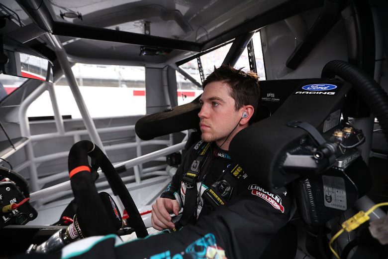 Chandler Smith sits in his truck at Darlington.