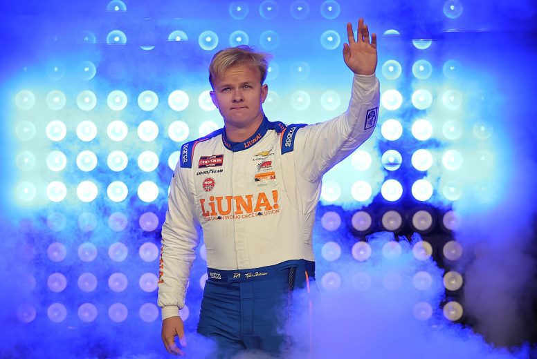 Tyler Ankrum waves to fans at Darlington.