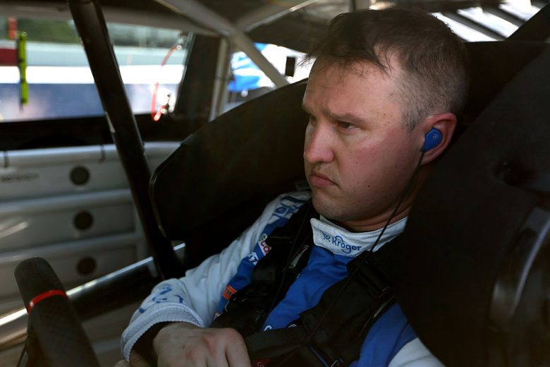 Ryan Preece sits in his car.