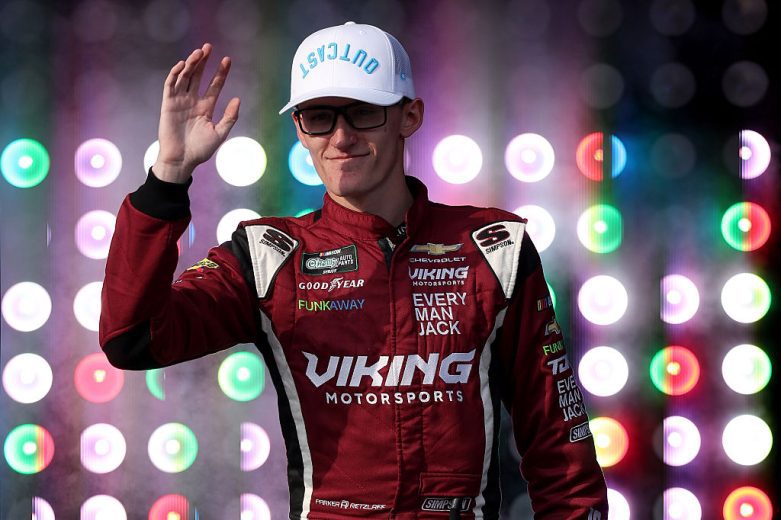 Parker Retzlaff waves to fans.