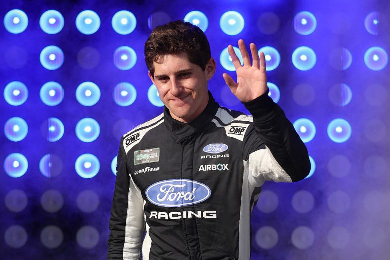 Nick Sanchez waves to fans.