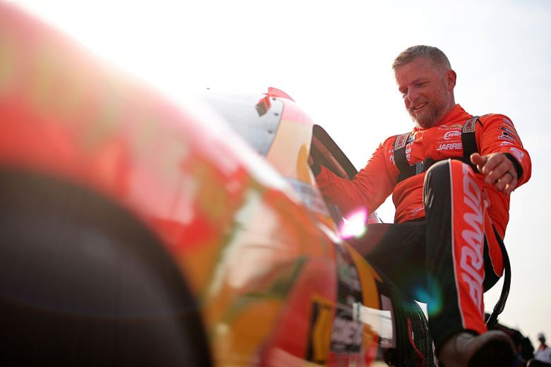 Justin Allgaier enters his car at Darlington.