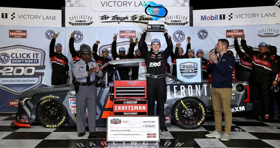Corey Heim celebrates in Victory Lane at Darlington.