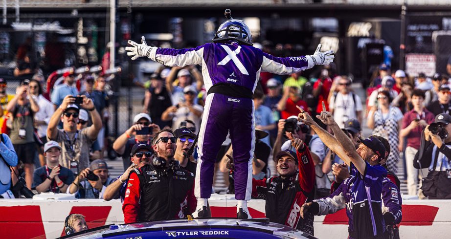 Tyler Reddick celebrates win with team.