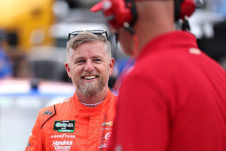 Justin Allgaier looks on.