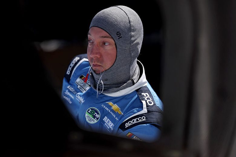 Kyle Busch looks on.