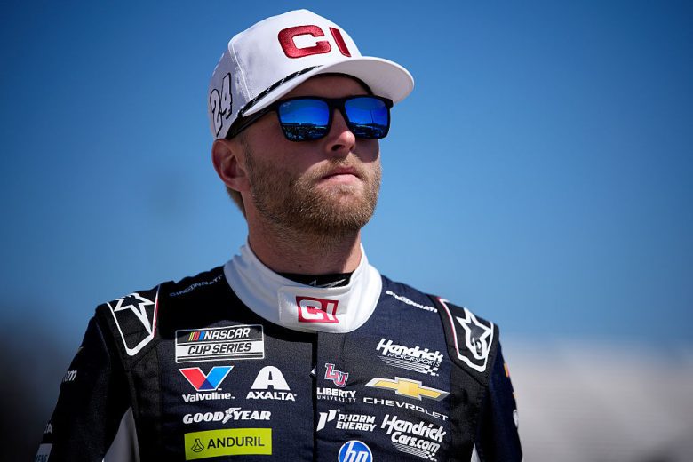 William Byron looks on.