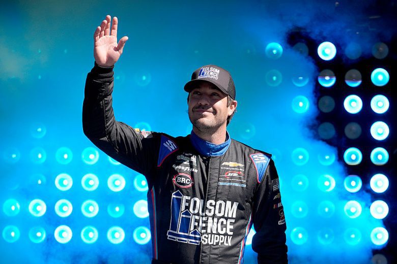 Lee Pulliam waves to fans at Martinsville.