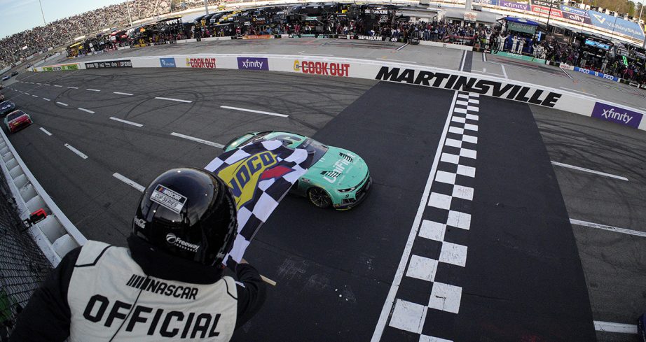 Chase Elliott takes the checkered flag at Martinsville.