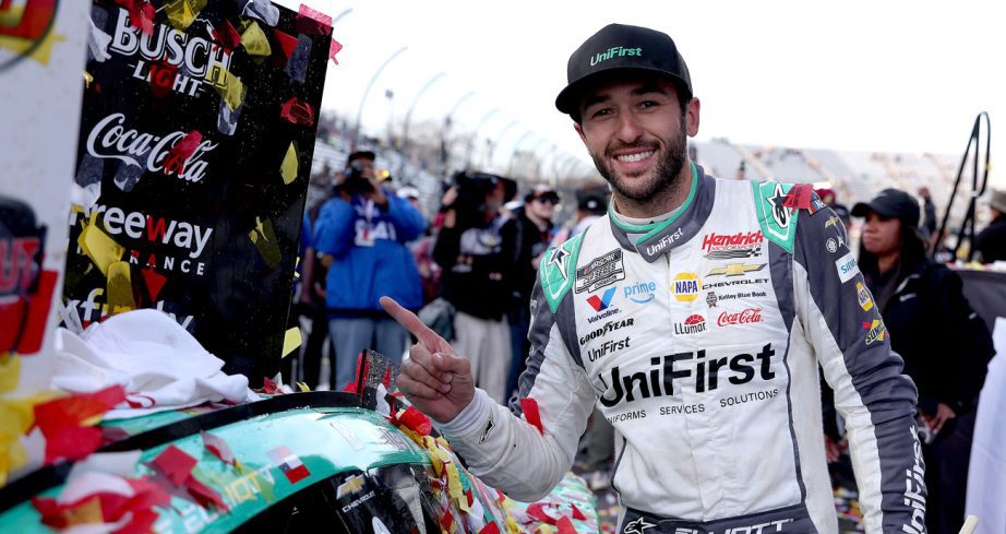 Chase Elliott poses for a photo following his NASCAR Cup Series win at Martinsville Speedway.