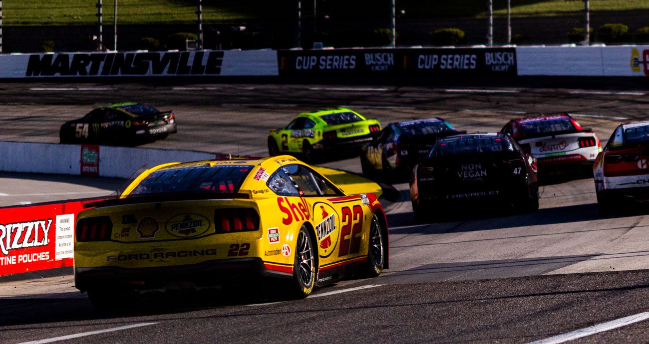 Joey Logano races at Martinsville.
