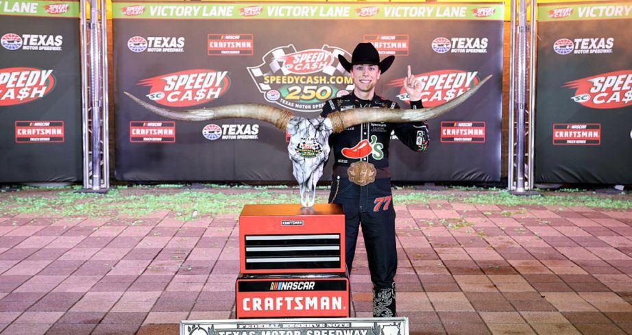 Carson Hocevar celebrates in Victory Lane at Texas.