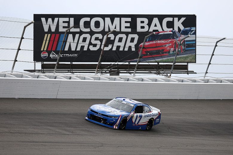 Corey Day drives at Rockingham.
