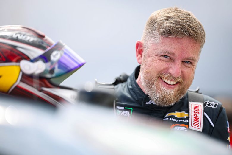 Justin Allgaier looks on.