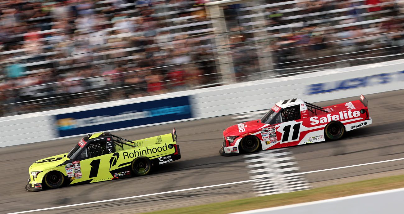 Corey Heim and Kaden Honeycutt race at Rockingham in the Truck Series.