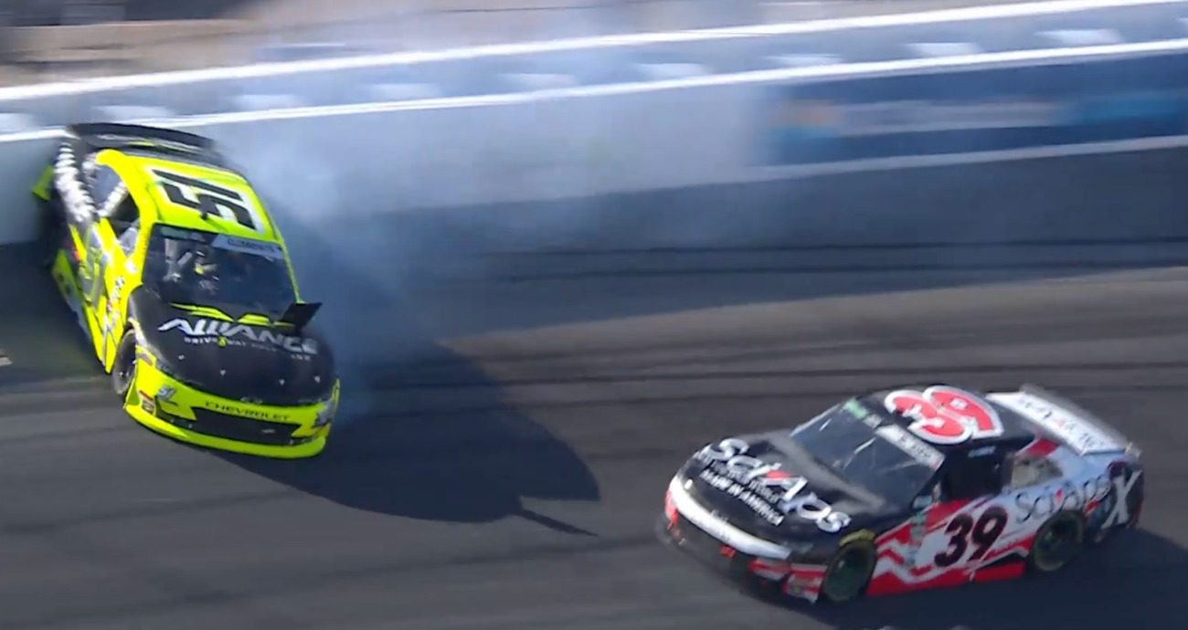 Sieg makes contact, spins out Clements on restart