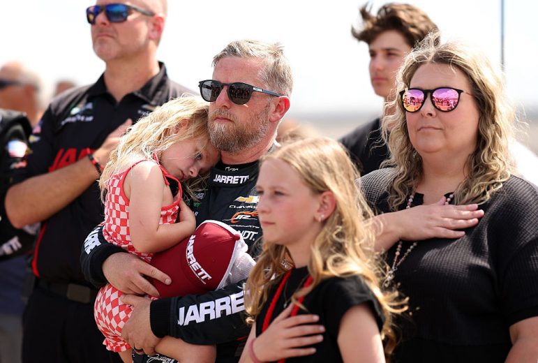 Justin Allgaier and his family look on.