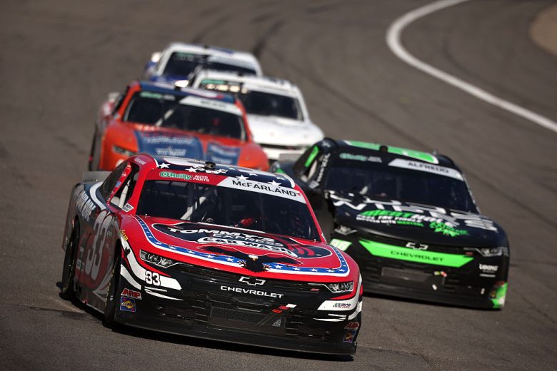 Cleetus McFarland and others drive at Rockingham.