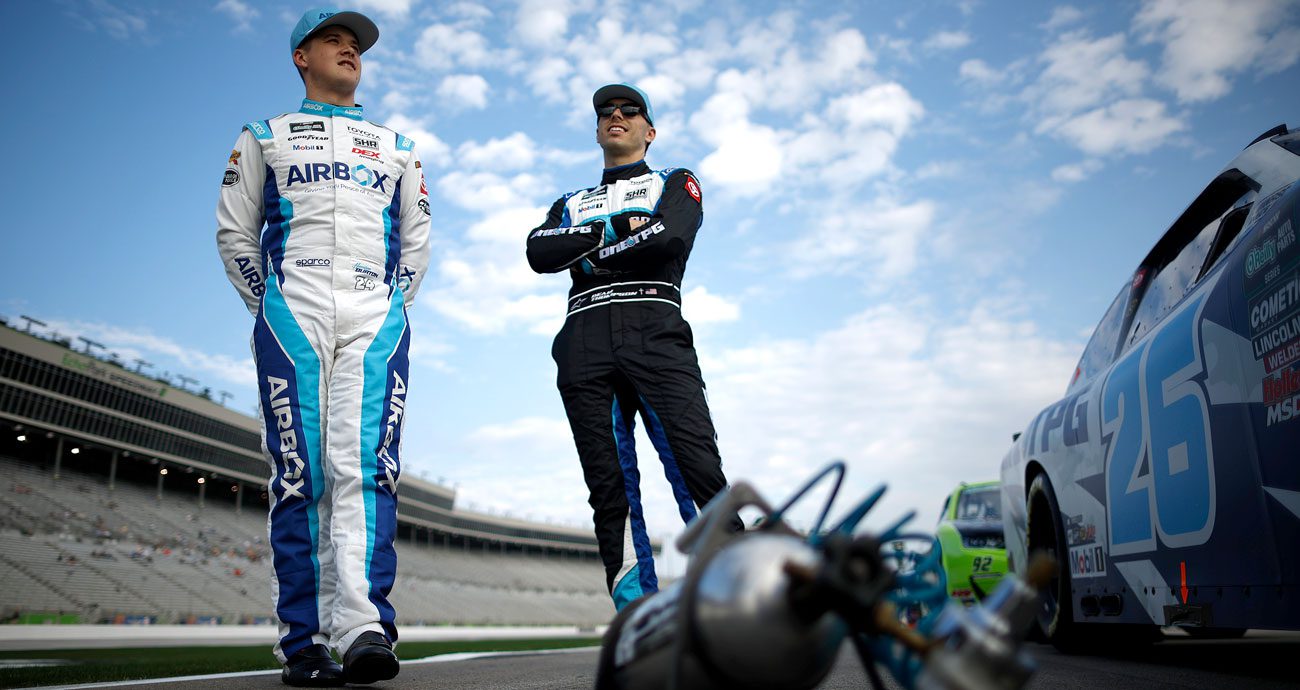 Harrison Burton (L) and Dean Thompson (R) talk at EchoPark Speedway.