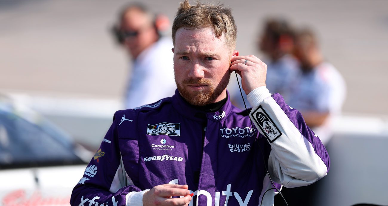 Tyler Reddick looks on.