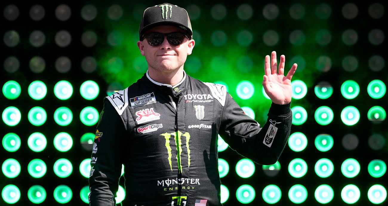 Ty Gibbs waves to the crowd before a NASCAR Cup Series race at Martinsville Speedway.