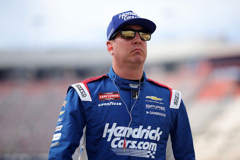 Kyle Busch looks on.