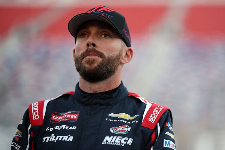 Ross Chastain looks on.