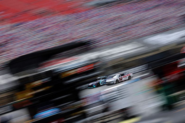 Tyler Reddick and Ryan Blaney drive at Bristol.