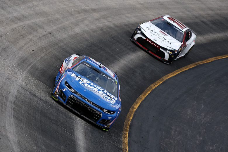 Kyle Larson and Denny Hamlin drive at Bristol.
