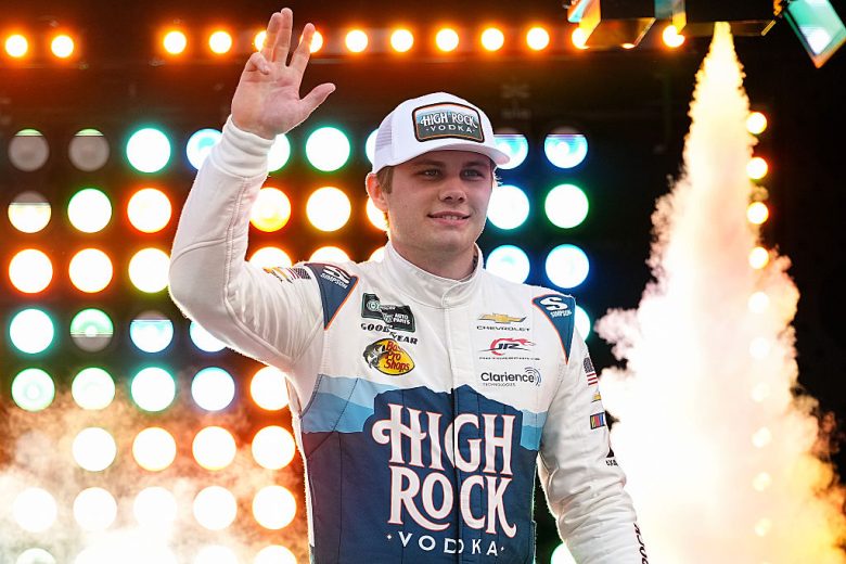 Carson Kvapil waves to fans.