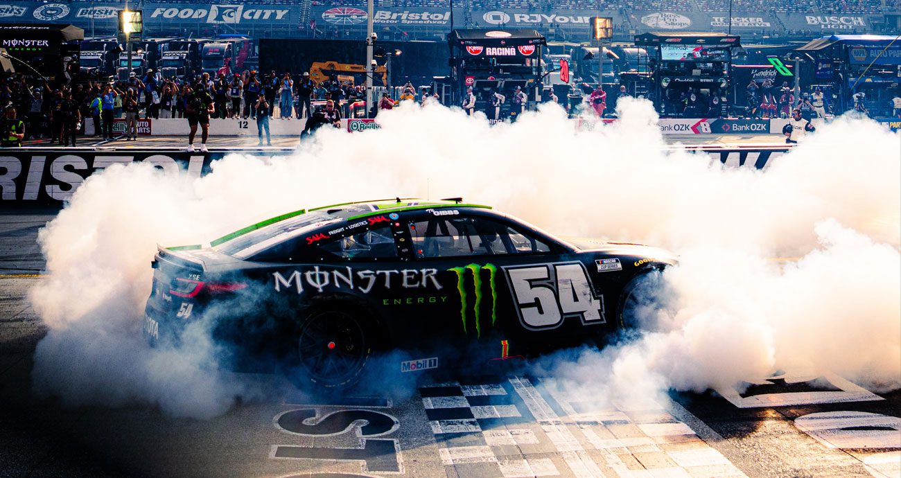 Ty Gibbs performs a burnout after winning at Bristol.