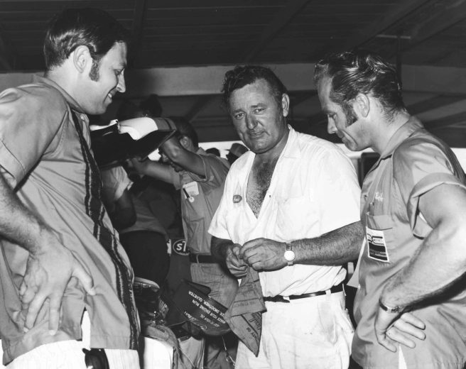 1971: Veteran NASCAR crew chief Herb Nab (C) in the garage area before a NASCAR race.