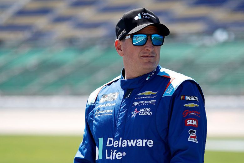 Michael McDowell looks on.