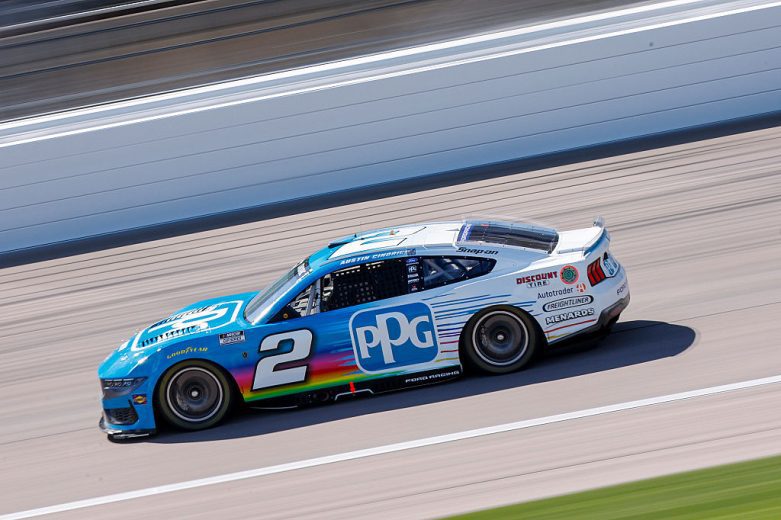Austin Cindric drives at Kansas.