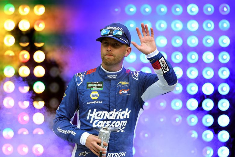 William Byron waves to fans.