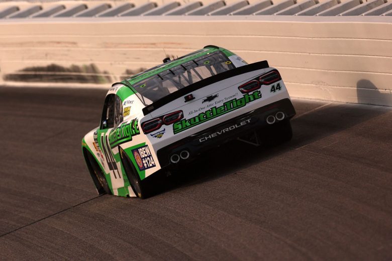 Brennan Poole drives at Kansas.