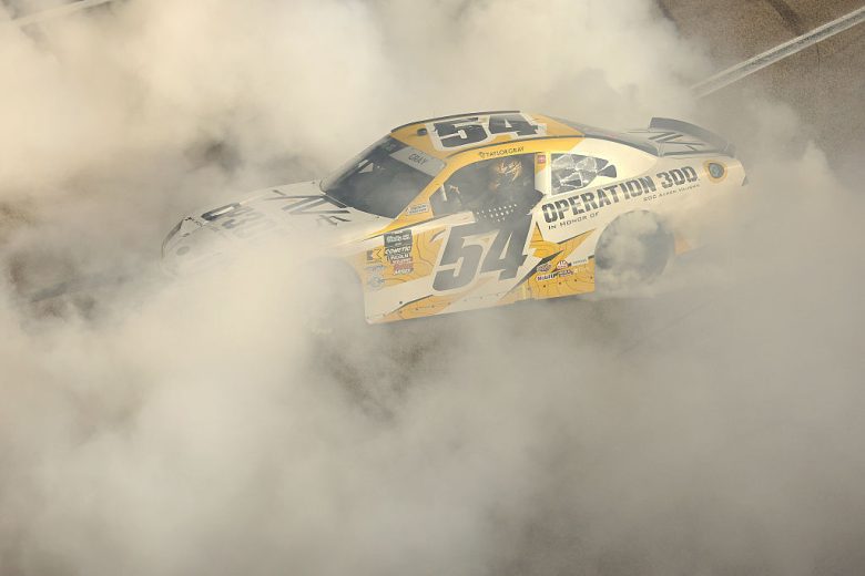 Taylor Gray celebrates with a burnout at Kansas.