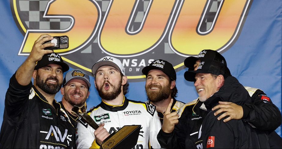 Taylor Gray celebrates in Victory Lane at Kansas.