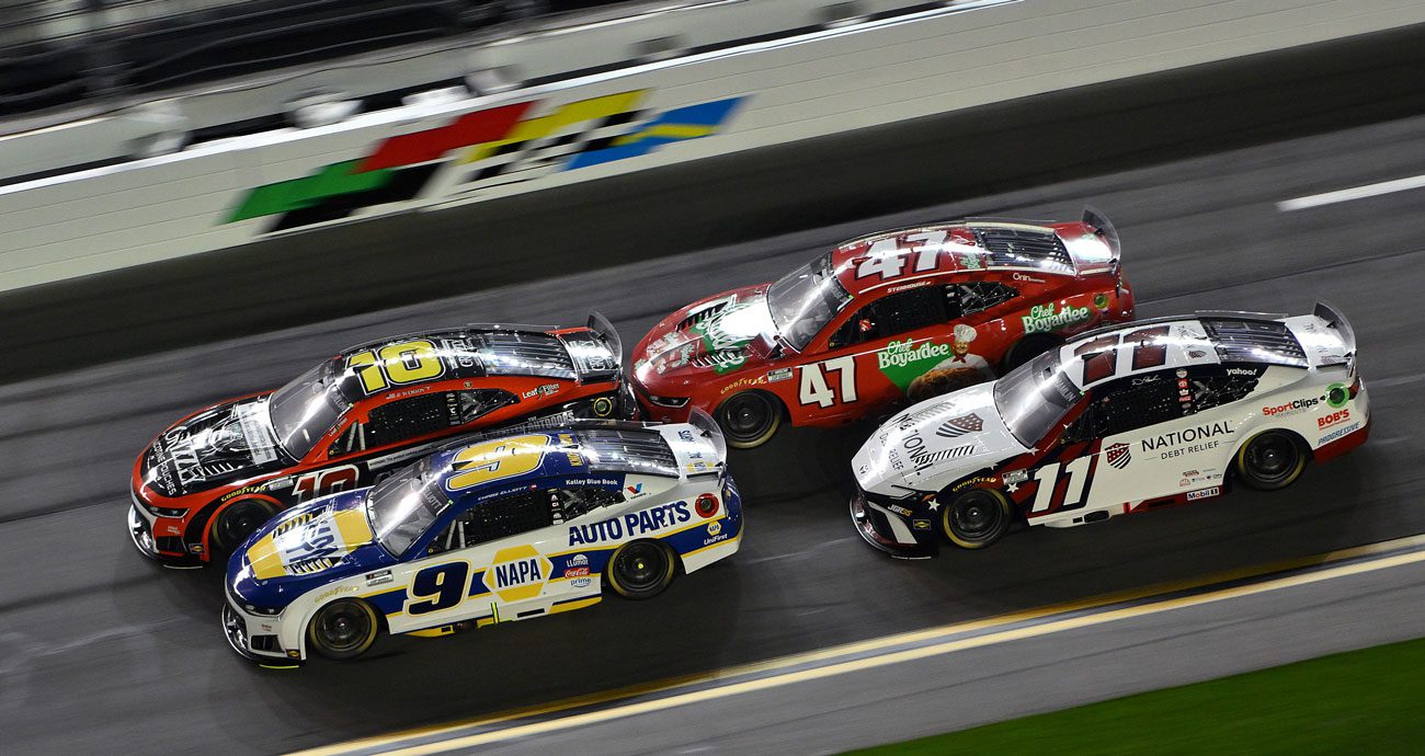 Ricky Stenhouse Jr. and Denny Hamlin race in the NASCAR Cup Series.