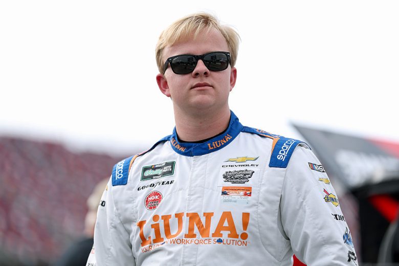 Tyler Ankrum looks on.