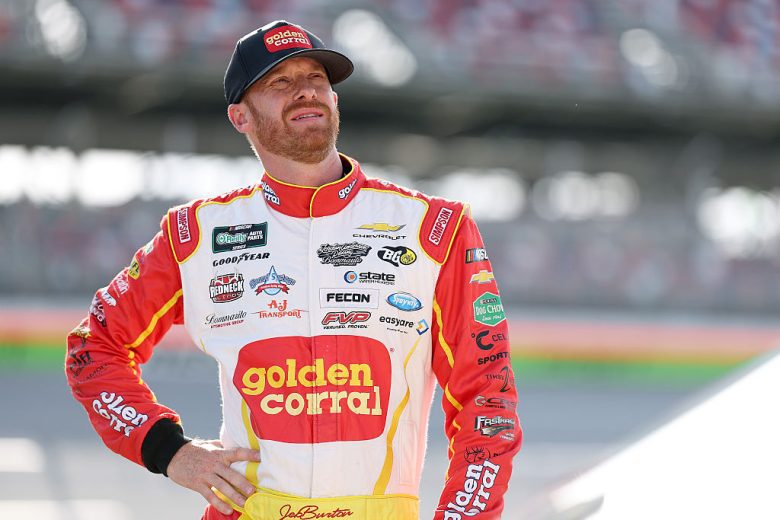 Jeb Burton looks on.