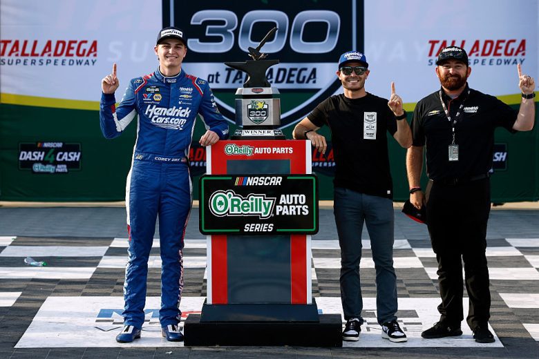 Corey Day celebrates in Victory Lane with Kyle Larson and Tyler Monn.