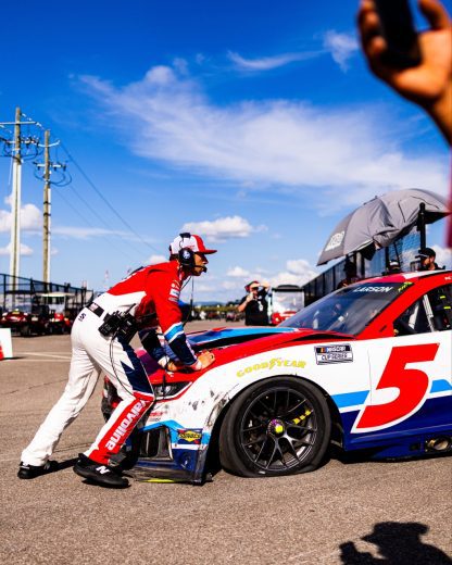 The No. 5 Chevrolet gets pushed to the garage following a NASCAR Cup Series wreck at Talladega Superspeedway.
