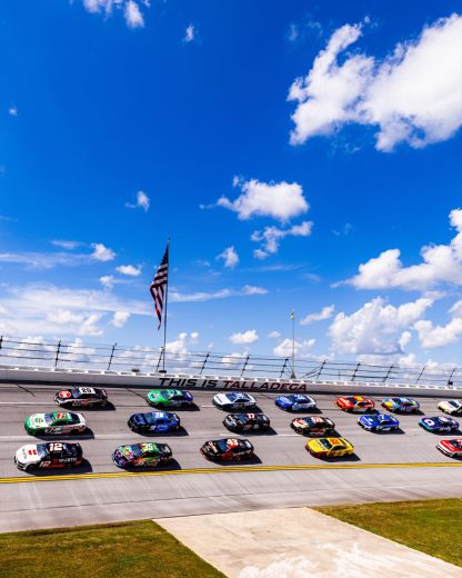 NASCAR Cup Series cars race at Talladega Superspeedway.
