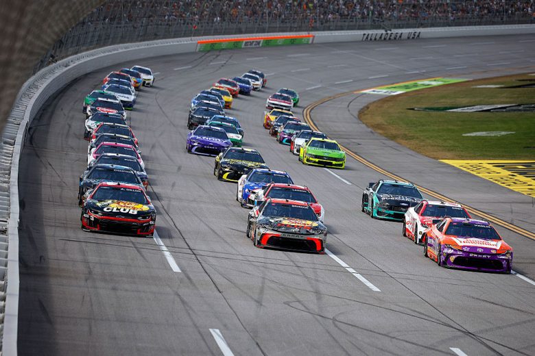 NASCAR Cup Series cars race at Talladega Superspeedway.